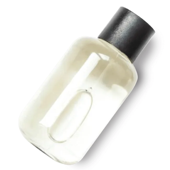 empty, clear glass bottle with a black cap